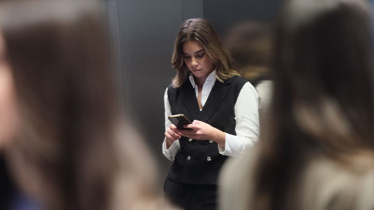 Woman use the phone in job